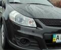Черный Сузуки СХ4, объемом двигателя 1.6 л и пробегом 82 тыс. км за 11500 $, фото 3 на Automoto.ua