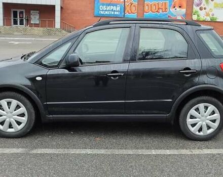 Черный Сузуки СХ4, объемом двигателя 1.6 л и пробегом 82 тыс. км за 11500 $, фото 7 на Automoto.ua