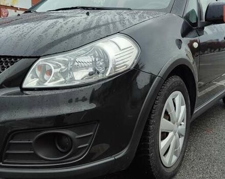 Черный Сузуки СХ4, объемом двигателя 1.6 л и пробегом 82 тыс. км за 11500 $, фото 4 на Automoto.ua