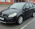 Черный Сузуки СХ4, объемом двигателя 1.6 л и пробегом 82 тыс. км за 11500 $, фото 1 на Automoto.ua