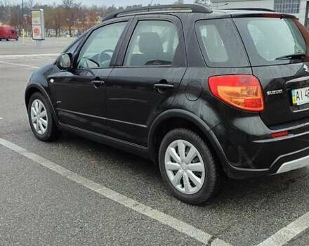 Черный Сузуки СХ4, объемом двигателя 1.6 л и пробегом 82 тыс. км за 11500 $, фото 5 на Automoto.ua