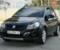Черный Сузуки СХ4, объемом двигателя 1.6 л и пробегом 43 тыс. км за 10500 $, фото 1 на Automoto.ua
