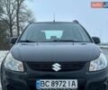 Чорний Сузукі СХ4, об'ємом двигуна 1.59 л та пробігом 162 тис. км за 7600 $, фото 1 на Automoto.ua