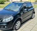 Черный Сузуки СХ4, объемом двигателя 1.6 л и пробегом 140 тыс. км за 9000 $, фото 1 на Automoto.ua