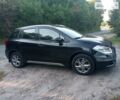 Черный Сузуки СХ4, объемом двигателя 1.6 л и пробегом 69 тыс. км за 13500 $, фото 1 на Automoto.ua