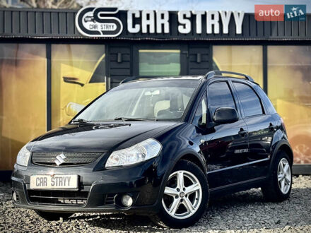 Черный Сузуки СХ4, объемом двигателя 1.6 л и пробегом 315 тыс. км за 5800 $, фото 1 на Automoto.ua