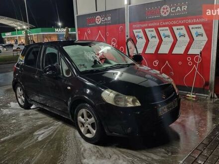 Черный Сузуки СХ4, объемом двигателя 1.6 л и пробегом 292 тыс. км за 2899 $, фото 1 на Automoto.ua