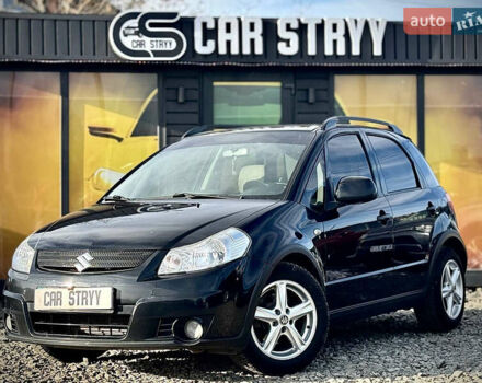 Черный Сузуки СХ4, объемом двигателя 1.6 л и пробегом 315 тыс. км за 5500 $, фото 1 на Automoto.ua