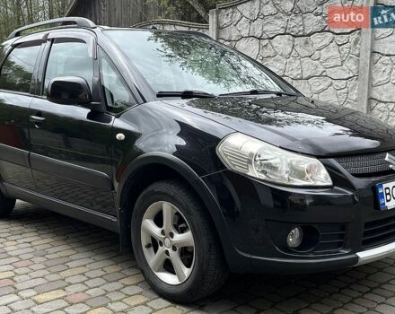 Черный Сузуки СХ4, объемом двигателя 1.6 л и пробегом 214 тыс. км за 5750 $, фото 1 на Automoto.ua