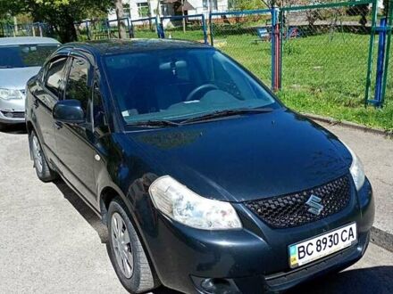 Черный Сузуки СХ4, объемом двигателя 1.6 л и пробегом 185 тыс. км за 6200 $, фото 1 на Automoto.ua