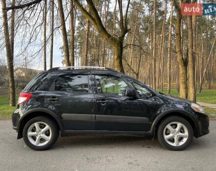 Черный Сузуки СХ4, объемом двигателя 2 л и пробегом 164 тыс. км за 7999 $, фото 1 на Automoto.ua