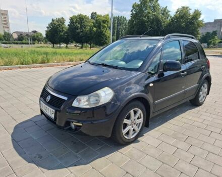 Черный Сузуки СХ4, объемом двигателя 1.6 л и пробегом 173 тыс. км за 6700 $, фото 1 на Automoto.ua