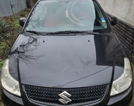 Черный Сузуки СХ4, объемом двигателя 1.6 л и пробегом 130 тыс. км за 7300 $, фото 1 на Automoto.ua