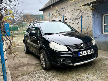 Черный Сузуки СХ4, объемом двигателя 1.6 л и пробегом 196 тыс. км за 3900 $, фото 1 на Automoto.ua