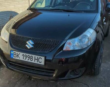 Черный Сузуки СХ4, объемом двигателя 1.59 л и пробегом 51 тыс. км за 8500 $, фото 1 на Automoto.ua