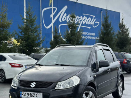 Черный Сузуки СХ4, объемом двигателя 1.59 л и пробегом 211 тыс. км за 7700 $, фото 1 на Automoto.ua