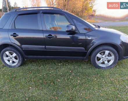Черный Сузуки СХ4, объемом двигателя 1.6 л и пробегом 248 тыс. км за 8300 $, фото 1 на Automoto.ua