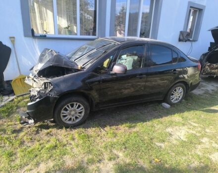 Черный Сузуки СХ4, объемом двигателя 2 л и пробегом 300 тыс. км за 1806 $, фото 1 на Automoto.ua