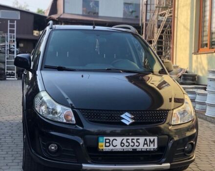 Черный Сузуки СХ4, объемом двигателя 1.6 л и пробегом 140 тыс. км за 9600 $, фото 1 на Automoto.ua
