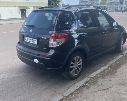 Черный Сузуки СХ4, объемом двигателя 2 л и пробегом 193 тыс. км за 8200 $, фото 1 на Automoto.ua