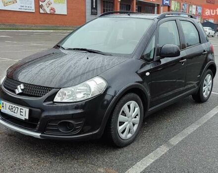 Черный Сузуки СХ4, объемом двигателя 1.6 л и пробегом 82 тыс. км за 11500 $, фото 1 на Automoto.ua