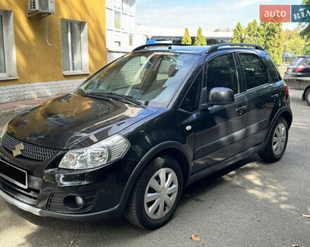 Черный Сузуки СХ4, объемом двигателя 1.6 л и пробегом 175 тыс. км за 8700 $, фото 1 на Automoto.ua