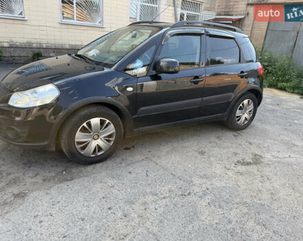 Черный Сузуки СХ4, объемом двигателя 1.6 л и пробегом 235 тыс. км за 9000 $, фото 1 на Automoto.ua