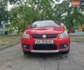 Красный Сузуки СХ4, объемом двигателя 1.6 л и пробегом 238 тыс. км за 5300 $, фото 1 на Automoto.ua