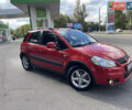 Красный Сузуки СХ4, объемом двигателя 1.6 л и пробегом 65 тыс. км за 8155 $, фото 1 на Automoto.ua