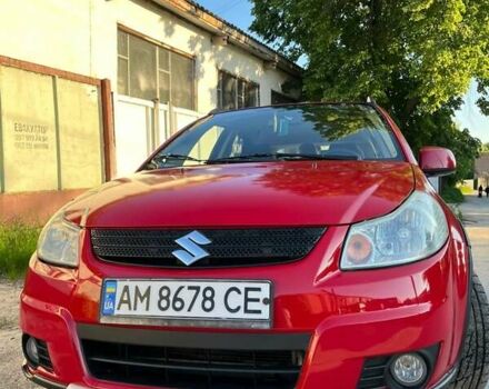 Красный Сузуки СХ4, объемом двигателя 1.6 л и пробегом 233 тыс. км за 5300 $, фото 6 на Automoto.ua