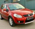Красный Сузуки СХ4, объемом двигателя 1.6 л и пробегом 137 тыс. км за 7333 $, фото 1 на Automoto.ua