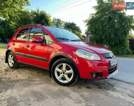 Красный Сузуки СХ4, объемом двигателя 1.6 л и пробегом 233 тыс. км за 5300 $, фото 1 на Automoto.ua