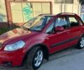 Красный Сузуки СХ4, объемом двигателя 1.6 л и пробегом 233 тыс. км за 5300 $, фото 4 на Automoto.ua
