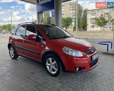 Красный Сузуки СХ4, объемом двигателя 1.59 л и пробегом 65 тыс. км за 8500 $, фото 2 на Automoto.ua