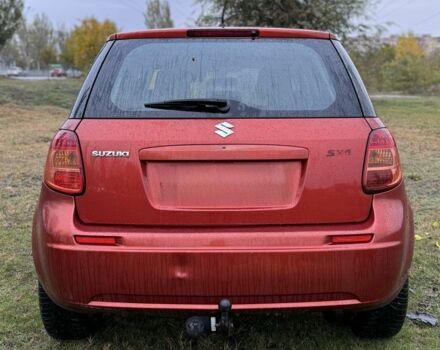 Красный Сузуки СХ4, объемом двигателя 1.6 л и пробегом 235 тыс. км за 3200 $, фото 3 на Automoto.ua
