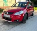 Красный Сузуки СХ4, объемом двигателя 1.6 л и пробегом 233 тыс. км за 5300 $, фото 1 на Automoto.ua