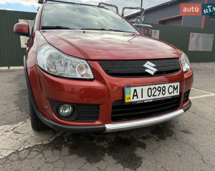 Сузуки СХ4 2007 в Борисполе на Automoto.ua Красный Сузуки СХ4, объемом двигателя 1.6 л и пробегом 141 тыс. км за 7000 $, фото 4 на Automoto.ua