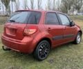 Красный Сузуки СХ4, объемом двигателя 1.6 л и пробегом 235 тыс. км за 3200 $, фото 4 на Automoto.ua