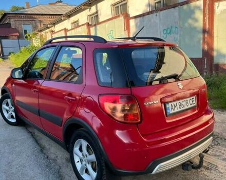 Красный Сузуки СХ4, объемом двигателя 1.6 л и пробегом 233 тыс. км за 5300 $, фото 2 на Automoto.ua