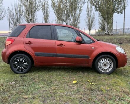 Красный Сузуки СХ4, объемом двигателя 1.6 л и пробегом 235 тыс. км за 3200 $, фото 5 на Automoto.ua