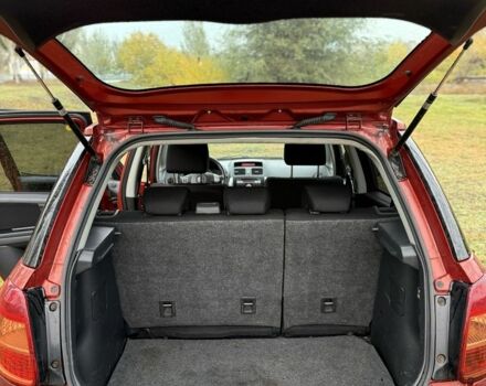 Красный Сузуки СХ4, объемом двигателя 1.6 л и пробегом 235 тыс. км за 3200 $, фото 10 на Automoto.ua