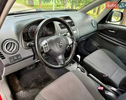 Красный Сузуки СХ4, объемом двигателя 1.6 л и пробегом 145 тыс. км за 7699 $, фото 19 на Automoto.ua