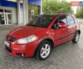 Красный Сузуки СХ4, объемом двигателя 1.59 л и пробегом 65 тыс. км за 8500 $, фото 1 на Automoto.ua