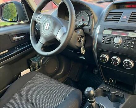 Красный Сузуки СХ4, объемом двигателя 1.6 л и пробегом 233 тыс. км за 5300 $, фото 18 на Automoto.ua