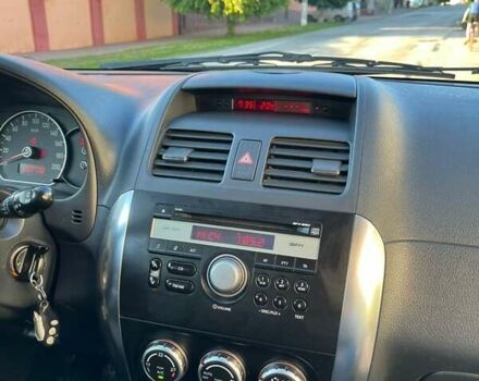 Красный Сузуки СХ4, объемом двигателя 1.6 л и пробегом 233 тыс. км за 5300 $, фото 19 на Automoto.ua