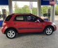 Красный Сузуки СХ4, объемом двигателя 1.59 л и пробегом 65 тыс. км за 8500 $, фото 3 на Automoto.ua