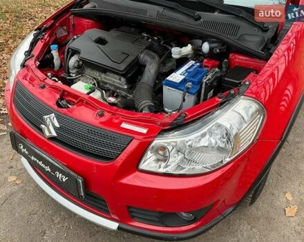 Красный Сузуки СХ4, объемом двигателя 1.6 л и пробегом 101 тыс. км за 7700 $, фото 17 на Automoto.ua
