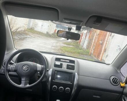 Красный Сузуки СХ4, объемом двигателя 1.6 л и пробегом 183 тыс. км за 6800 $, фото 5 на Automoto.ua