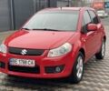 Красный Сузуки СХ4, объемом двигателя 1.59 л и пробегом 191 тыс. км за 5999 $, фото 1 на Automoto.ua