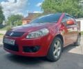 Красный Сузуки СХ4, объемом двигателя 1.6 л и пробегом 222 тыс. км за 6300 $, фото 2 на Automoto.ua